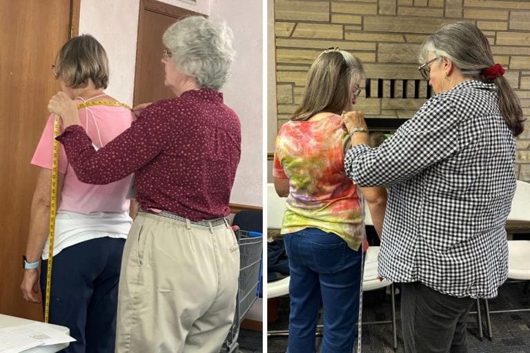 Chapter members measuring each other.